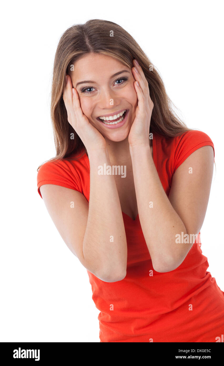 Cheerful woman surprised and holding her face with her hands, isolated on white Stock Photo