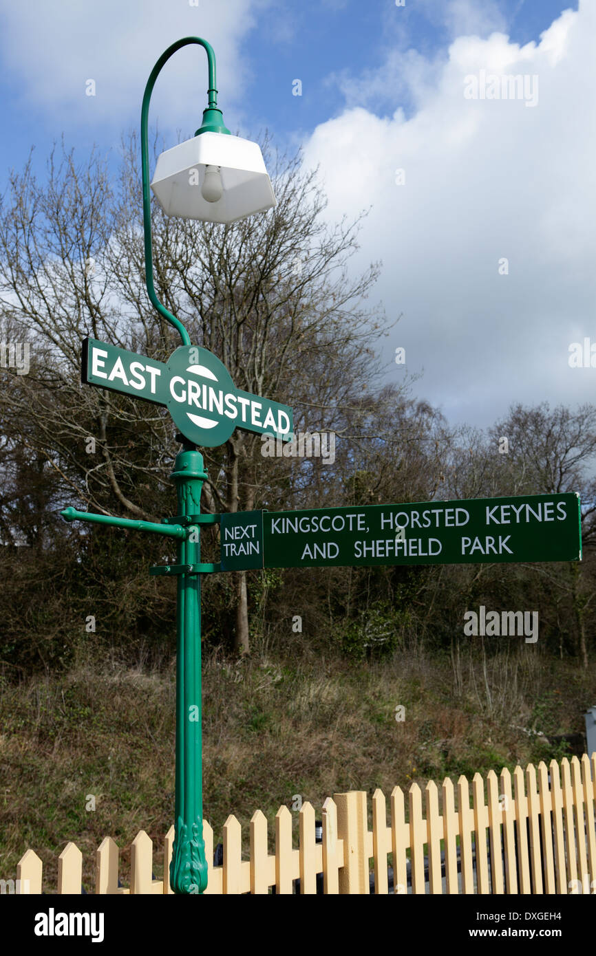 Lamppost and destination board at East Ginstead station, Bluebell Railway Stock Photo