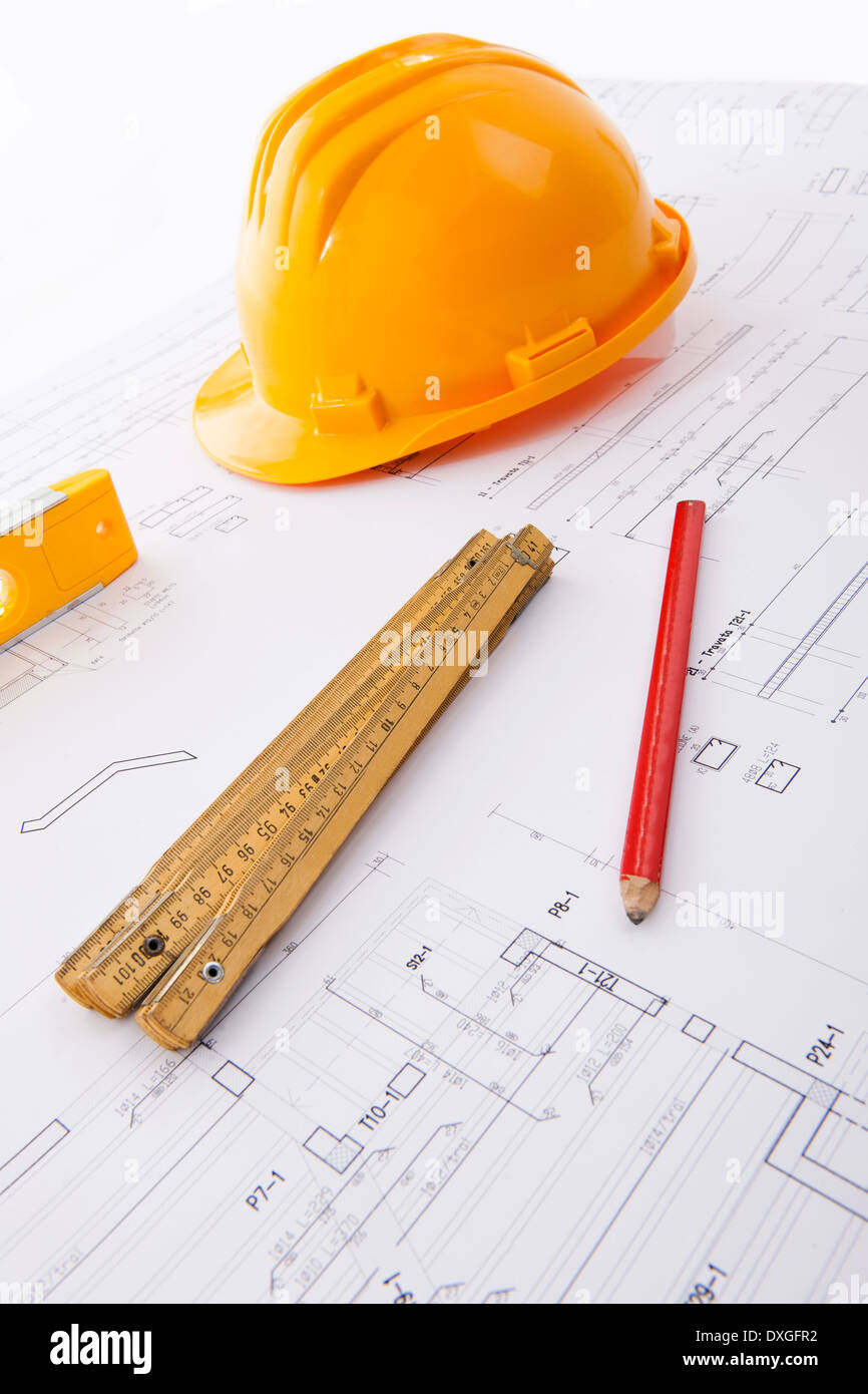 Hard hat and tools on a blueprint Stock Photo - Alamy