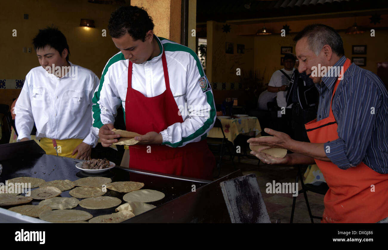 America, Mexico, Tlaxcala state, Calpulalpancity, Barbacoa restaurant, Making tortilla Stock Photo