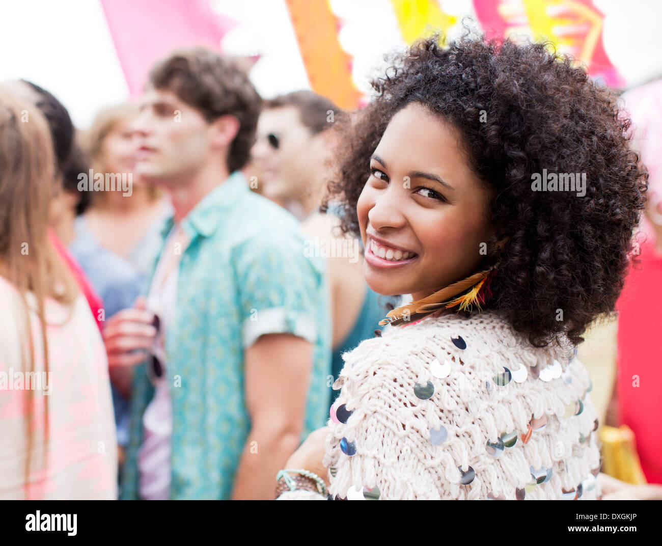 Portrait of smiling woman at music festival Stock Photo