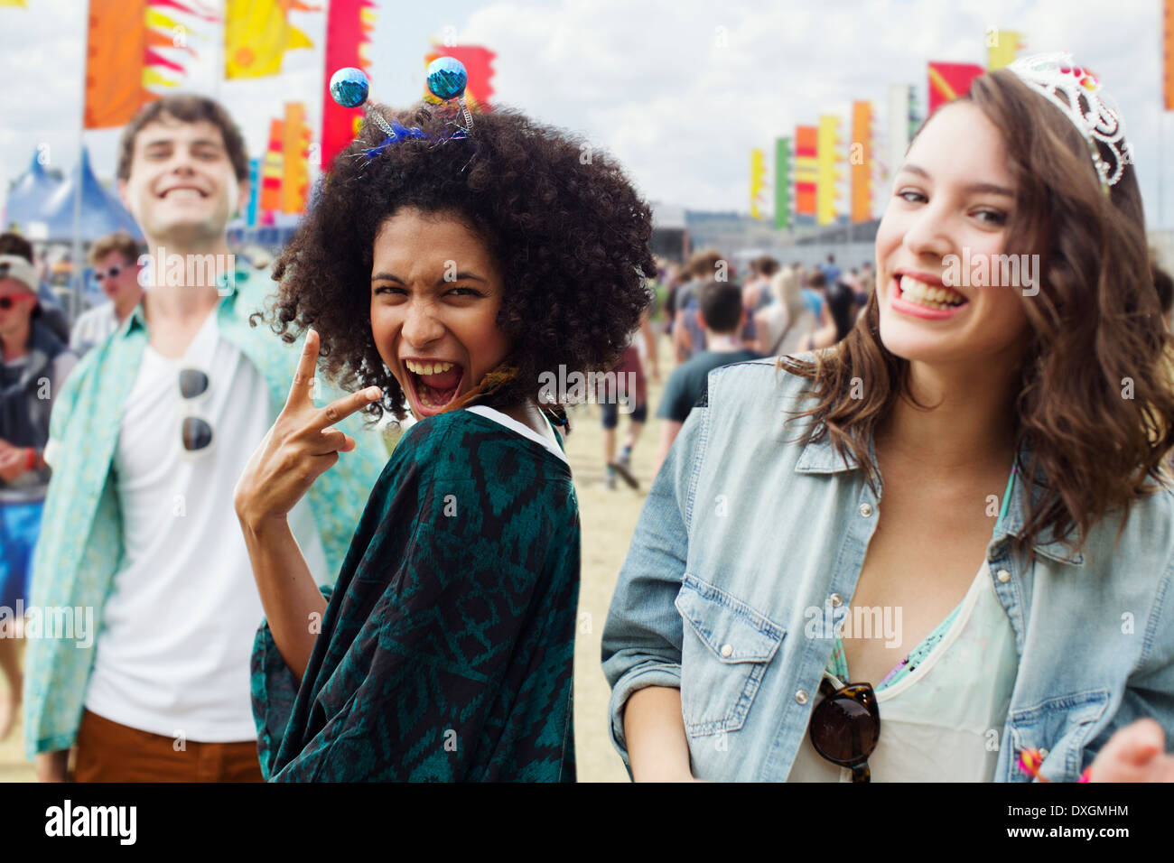 Enthusiastic friends at music festival Stock Photo