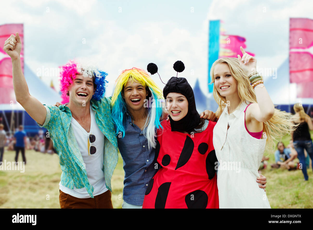 Portrait of friends in costumes at music festival Stock Photo