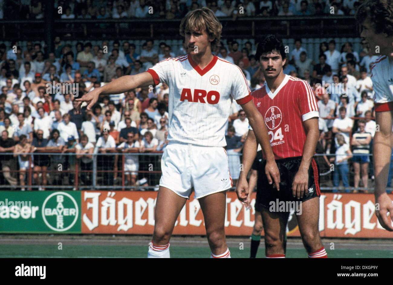 football, Bundesliga, 1983/1984, Ulrich Haberland Stadium, Bayer 04 Leverkusen versus 1. FC Nuremberg 3:0, scene of the match, Alois Reinhardt (FCN) left and Herbert Waas (Bayer) Stock Photo