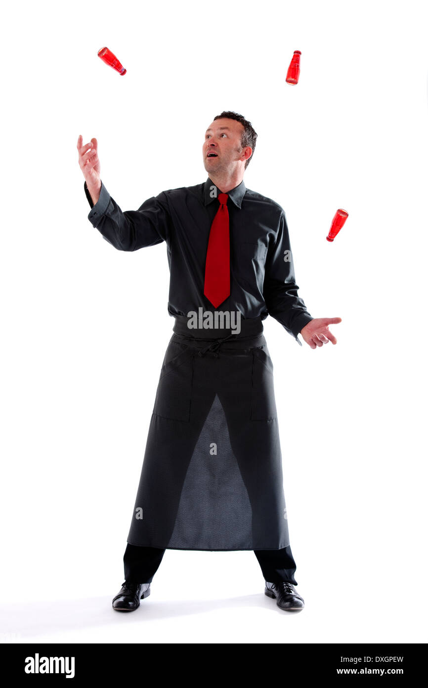 Bartender juggling bottles Stock Photo Alamy