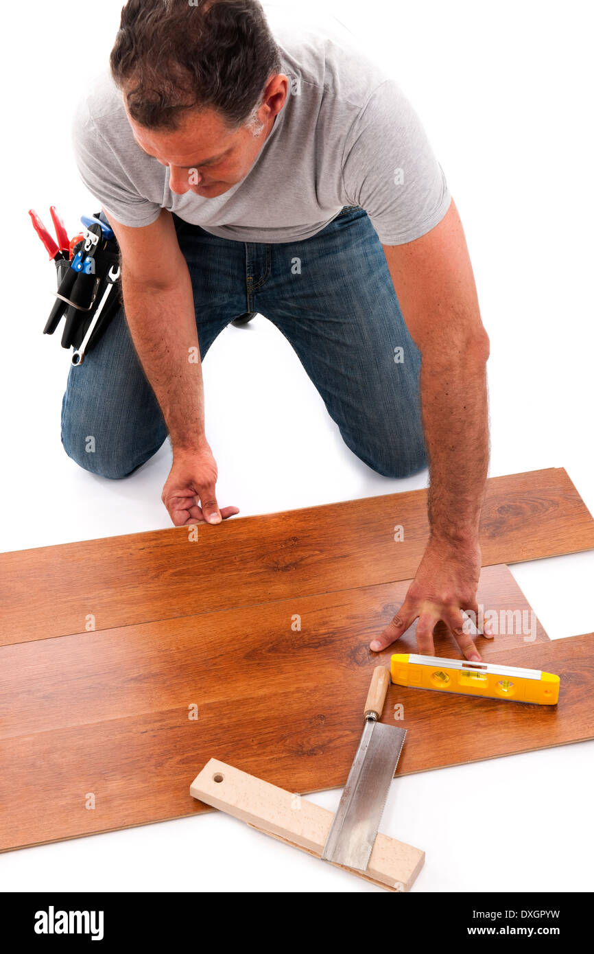 Carpenter working with wood planks Stock Photo
