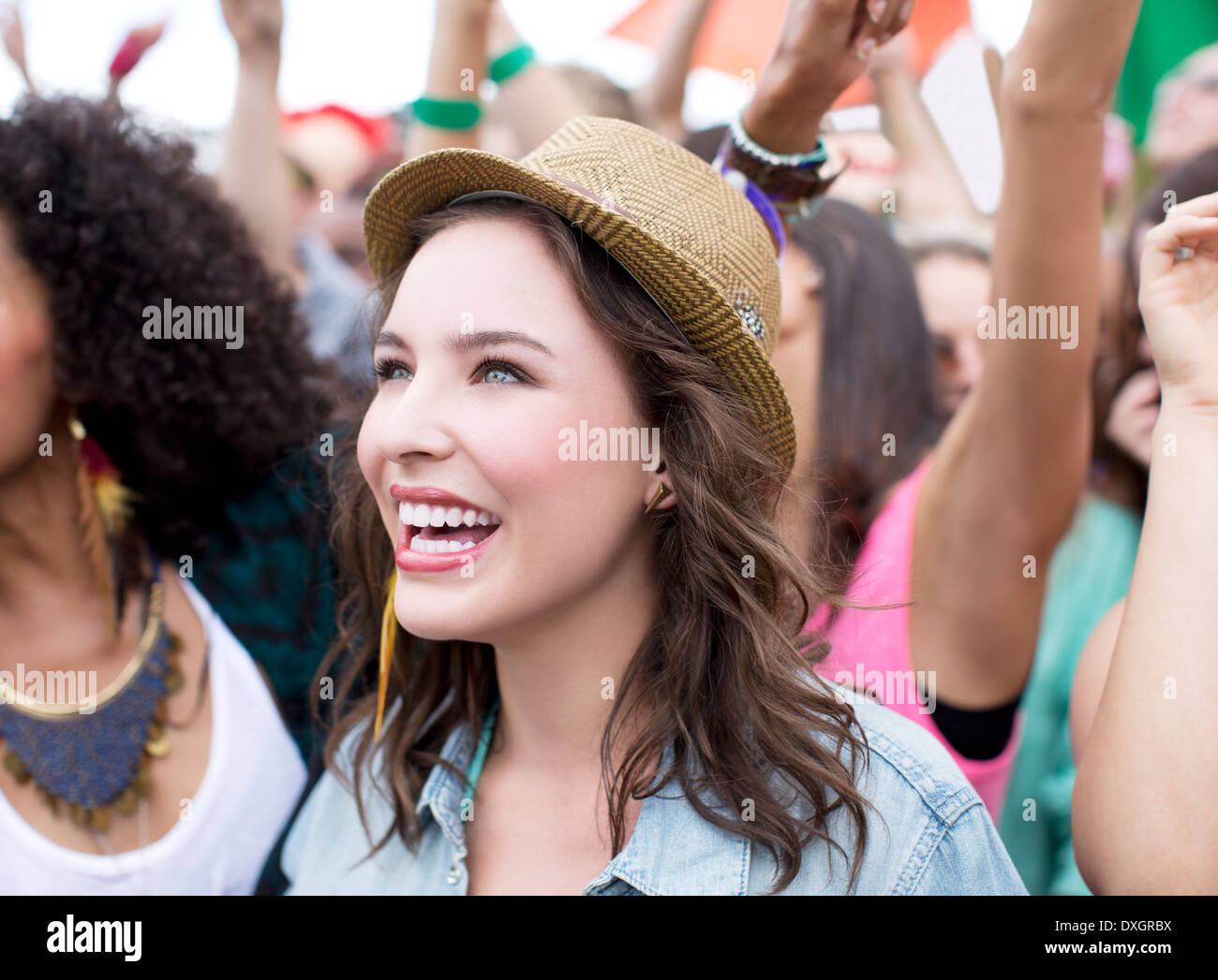 Happy woman at music festival Stock Photo