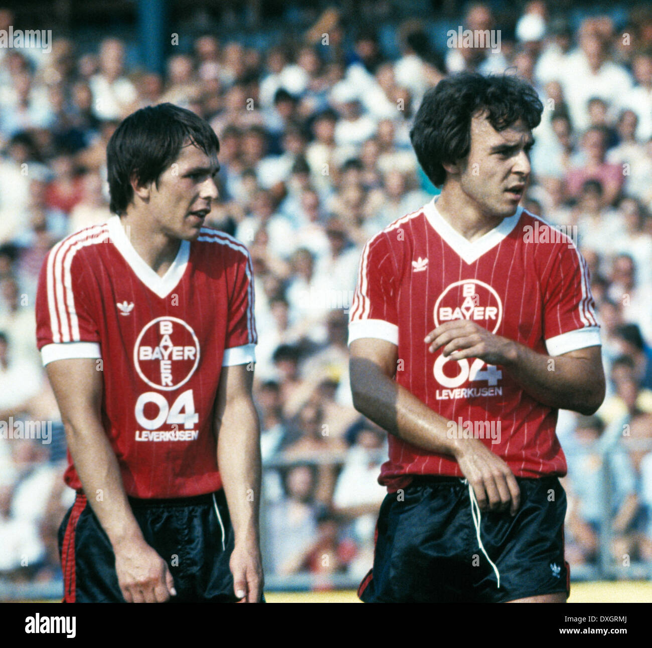 football, Bundesliga, 1983/1984, Ulrich Haberland Stadium, Bayer 04 Leverkusen versus 1. FC Nuremberg 3:0, scene of the match, Rudolf Wojtowicz (Bayer) left and Roman Geschlecht (Bayer) Stock Photo
