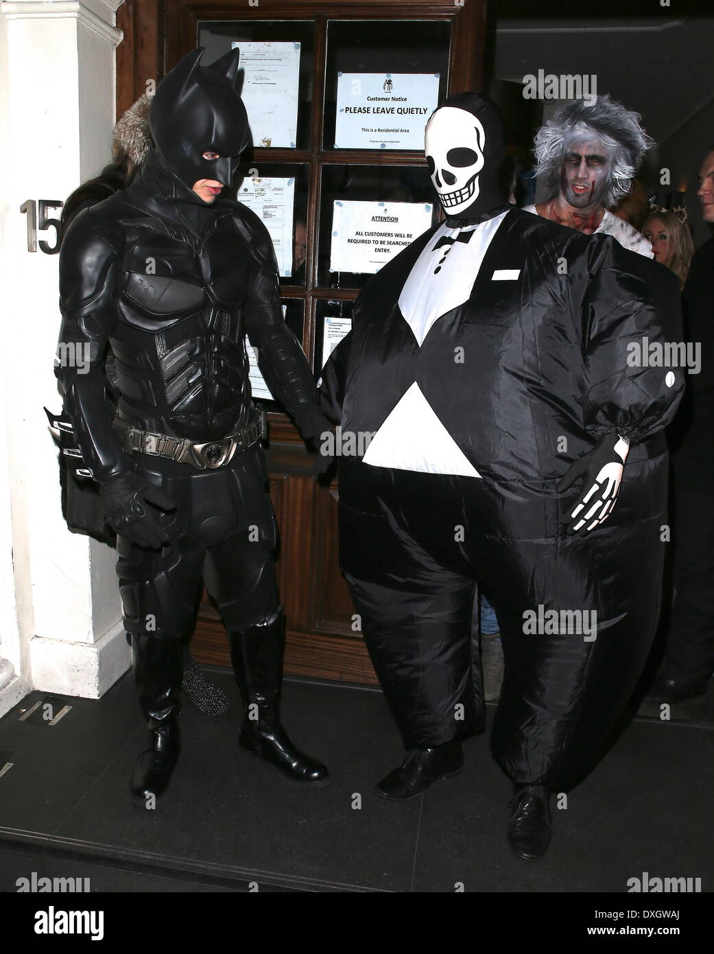 Liam Payne of One Direction dressed as Batman and Tom Daley in a fat  skeleton costume Celebrities at Funky Buddha nightclub for a Halloween  party London, England  Where: London, LONDON,
