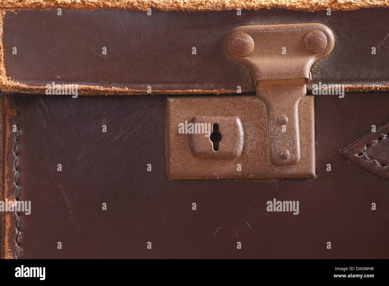 old fashioned leather handmade suitcase with latches lock and handle