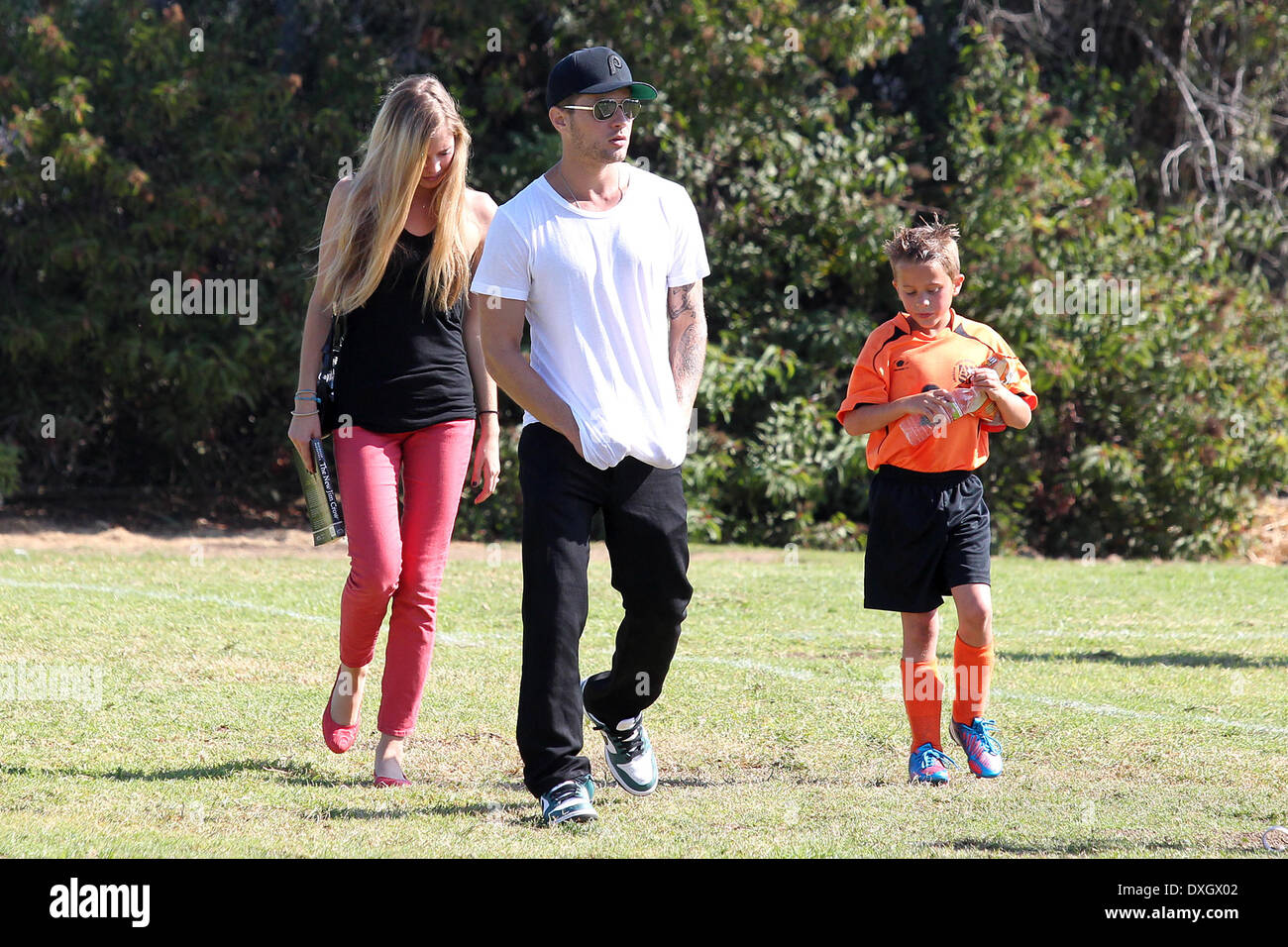 Paulina Slagter, Ryan Phillippe and Deacon Phillippe Ryan Phillippe at a park in Brentwood with his girlfriend to watch his son's soccer game Los Angeles, California - 03.11.12 Featuring: Paulina Slagter,Ryan Phillippe and Deacon Phillippe When: 03 Nov 2012 Stock Photo