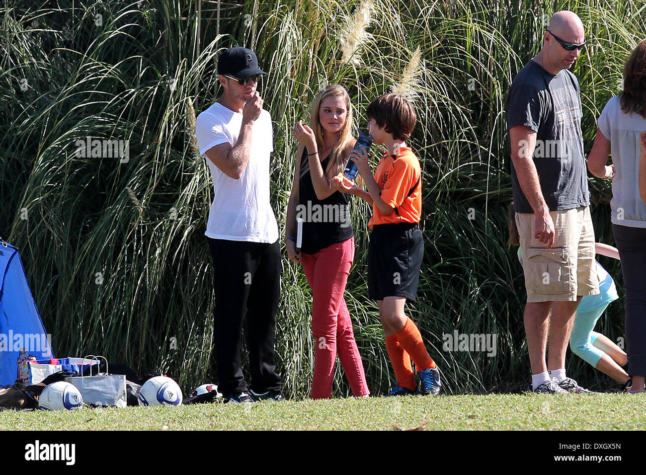 Ryan Phillippe and Paulina Slagter Ryan Phillippe at a park in Brentwood with his girlfriend to watch his son's soccer game Los Angeles, California - 03.11.12 Featuring: Ryan Phillippe and Paulina Slagter When: 03 Nov 2012 Stock Photo