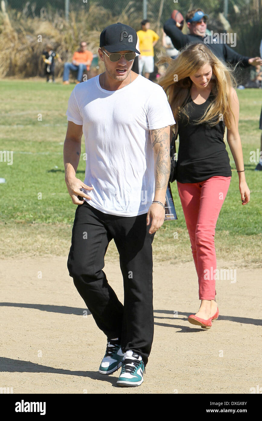 Ryan Phillippe, Paulina Slagter Ryan Phillippe at a park in Brentwood with his girlfriend to watch his son's soccer game Los Angeles, California - 03.11.12 Featuring: Ryan Phillippe,Paulina Slagter When: 03 Nov 2012 Stock Photo