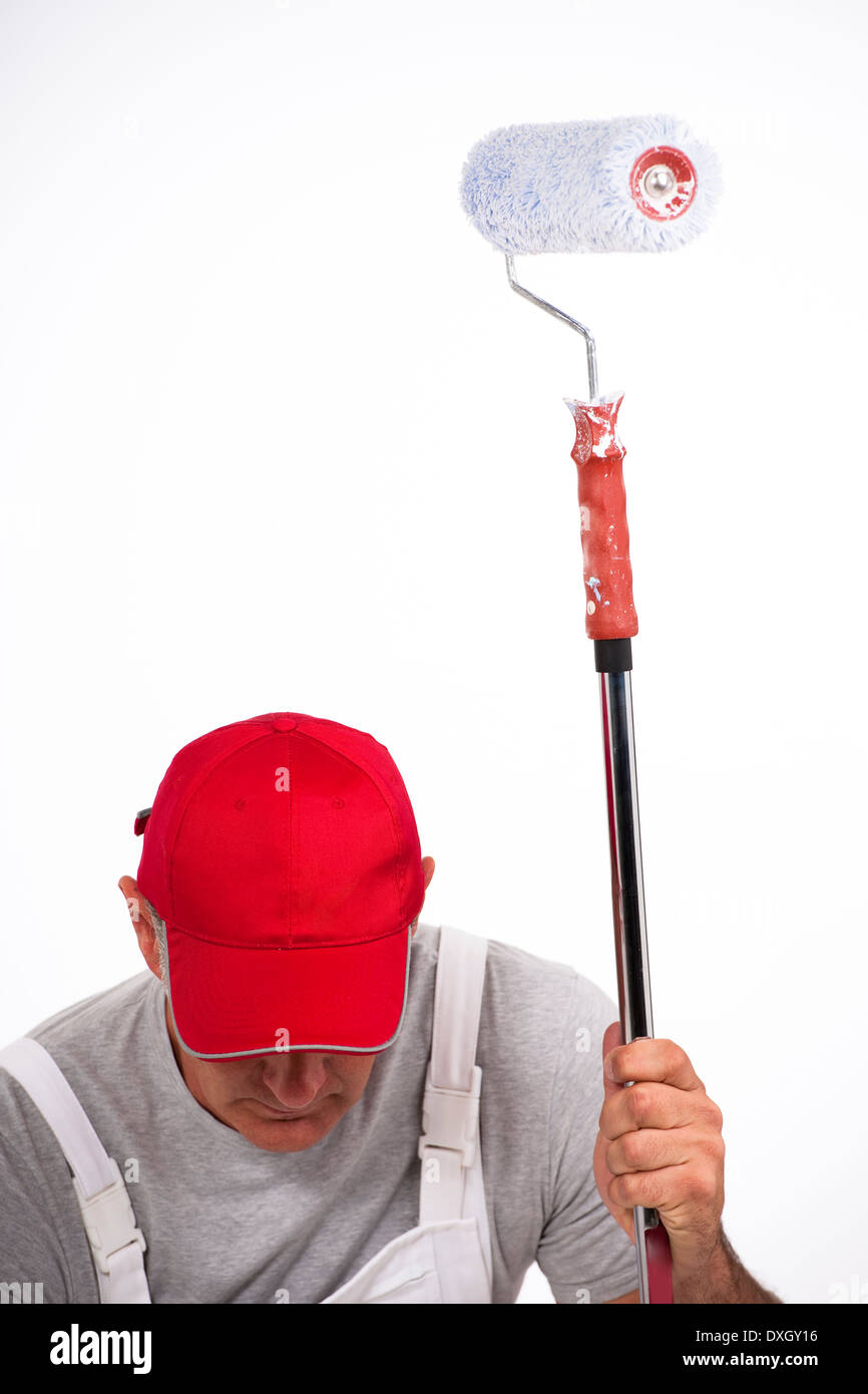 House painter in overalls Stock Photo Alamy