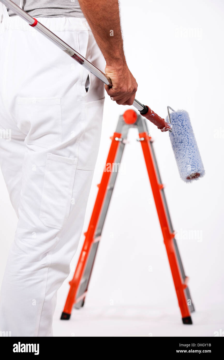 House painter in overalls Stock Photo Alamy