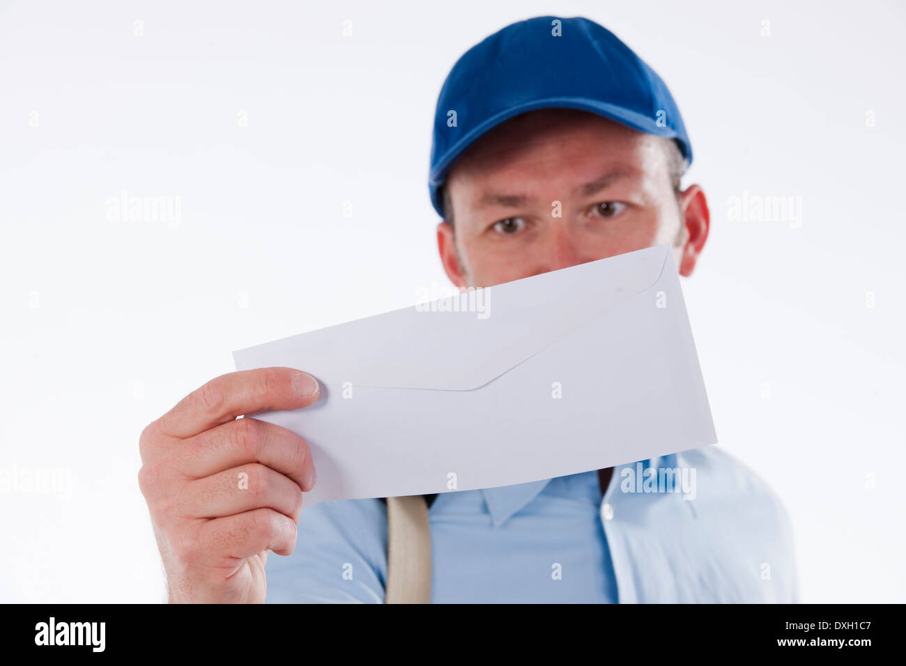 Mailman delivering mail Stock Photo