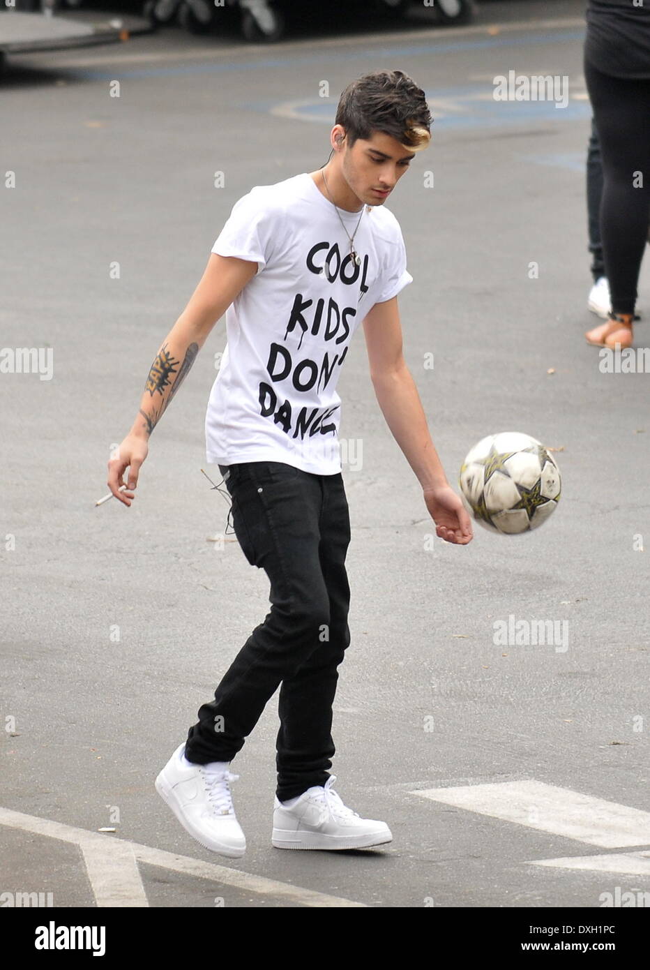 Zayn Malik One Direction band members playing soccer in the parking lot of  the X Factor Studio before rehearsing for their performance for tonight's  elimination show Los Angeles, California -08.11.12 Featuring: Zayn