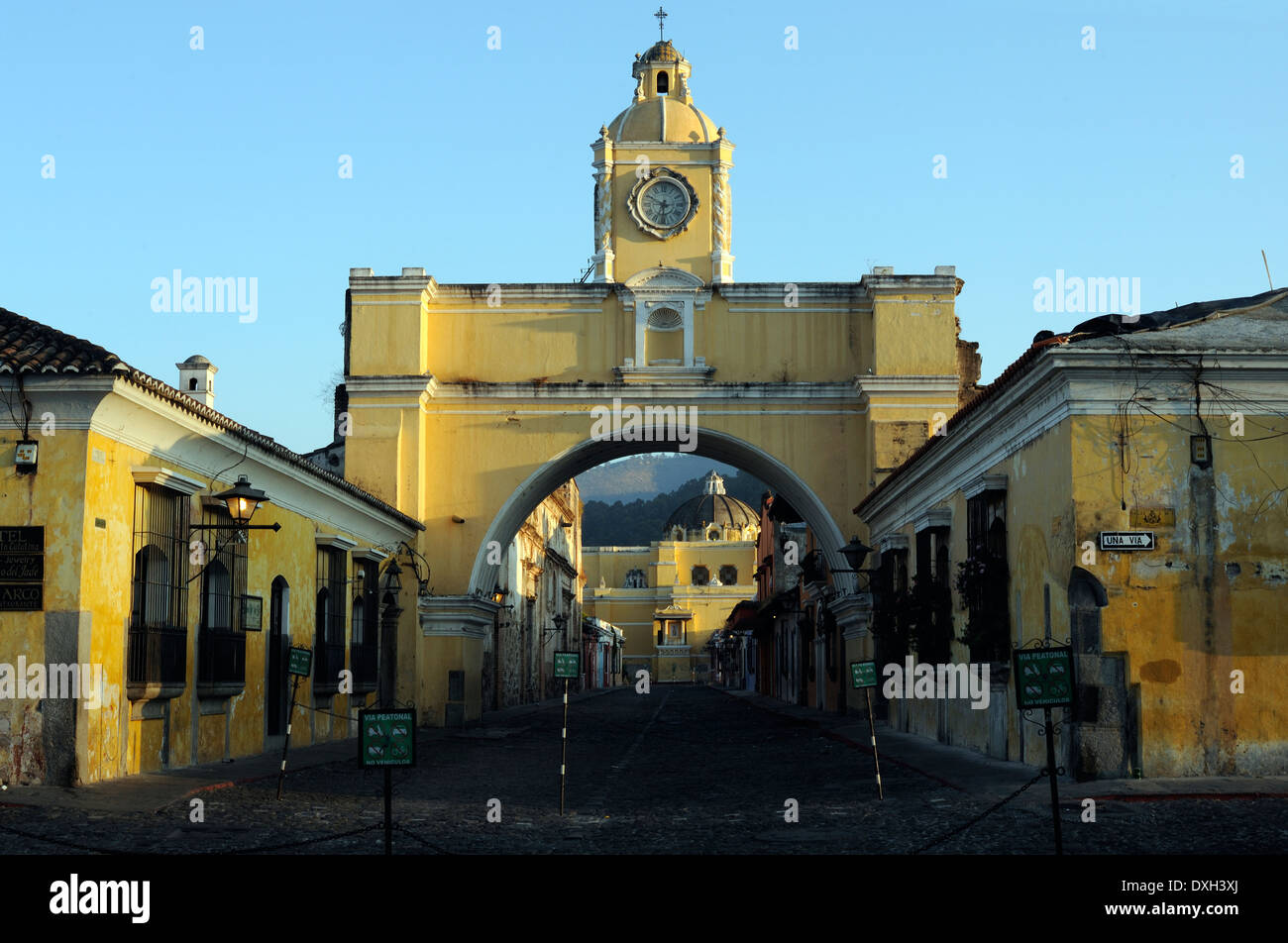 The church of  La Merced viewed through Arco de Santa Catalina, the Saint Catalina Arch, along 5 Avenida Norte Stock Photo