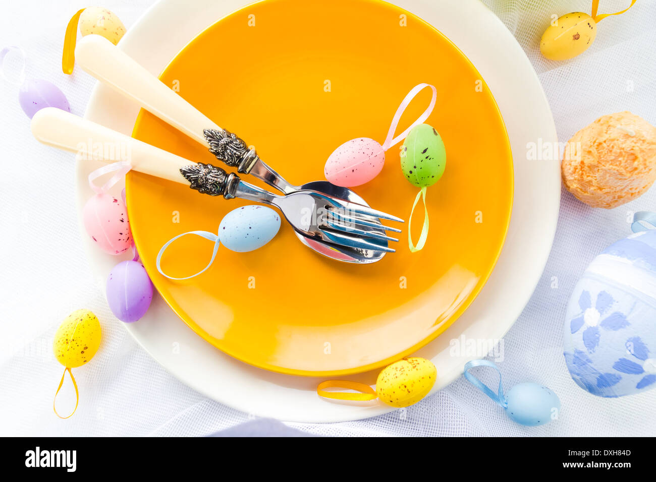 Closeup of Easter place setting with eggs Stock Photo