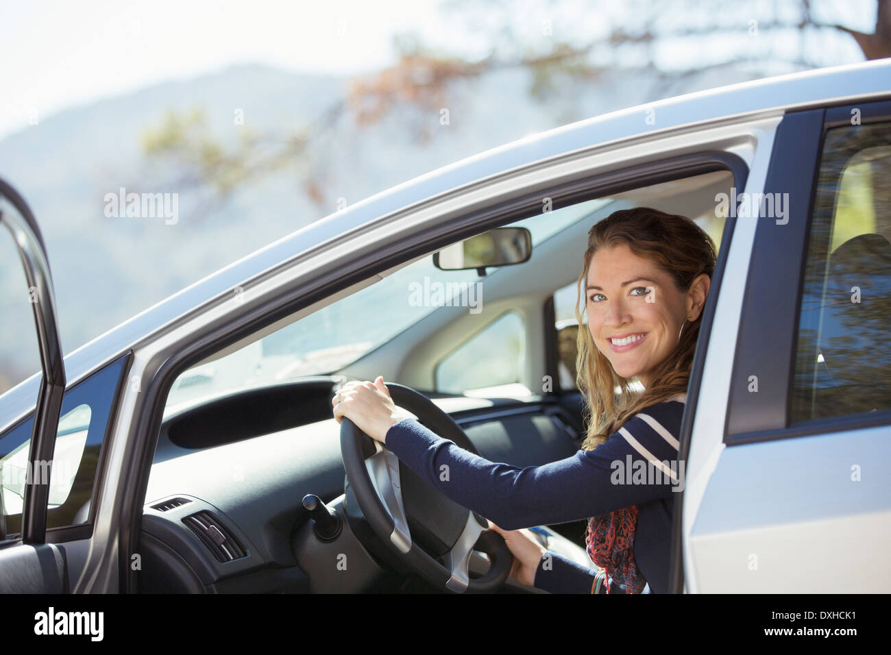 Portrait of confident woman inside car Stock Photo