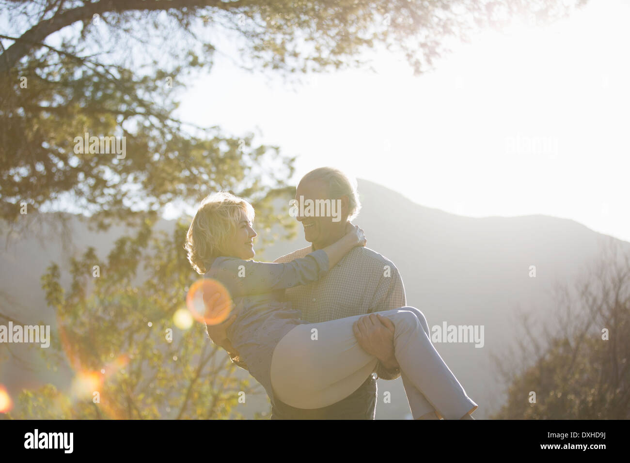 Man carrying woman hi-res stock photography and images - Alamy