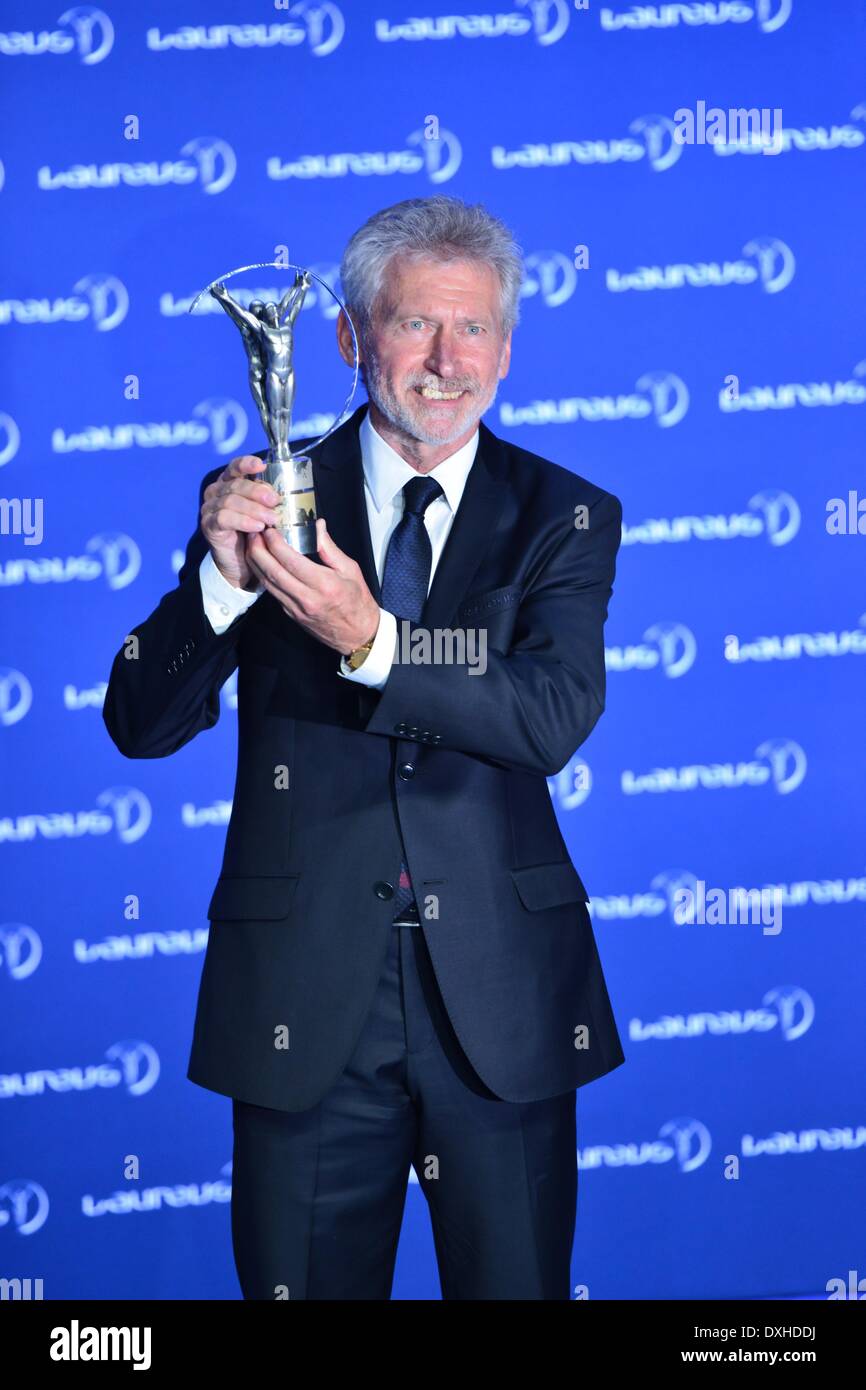 Kuala Lumpur. 26th Mar, 2014. Former football star Paul Breitner poses with the trophy for Team of the Year during the Laureus World Sports Awards ceremony on March 26, 2014, in Kuala Lumpur, Malaysia. Team Bayern Munich has been awarded as the Team of the Year at the Laureus World Sports Awards ceremony. Credit:  Chong Voonchung/Xinhua/Alamy Live News Stock Photo