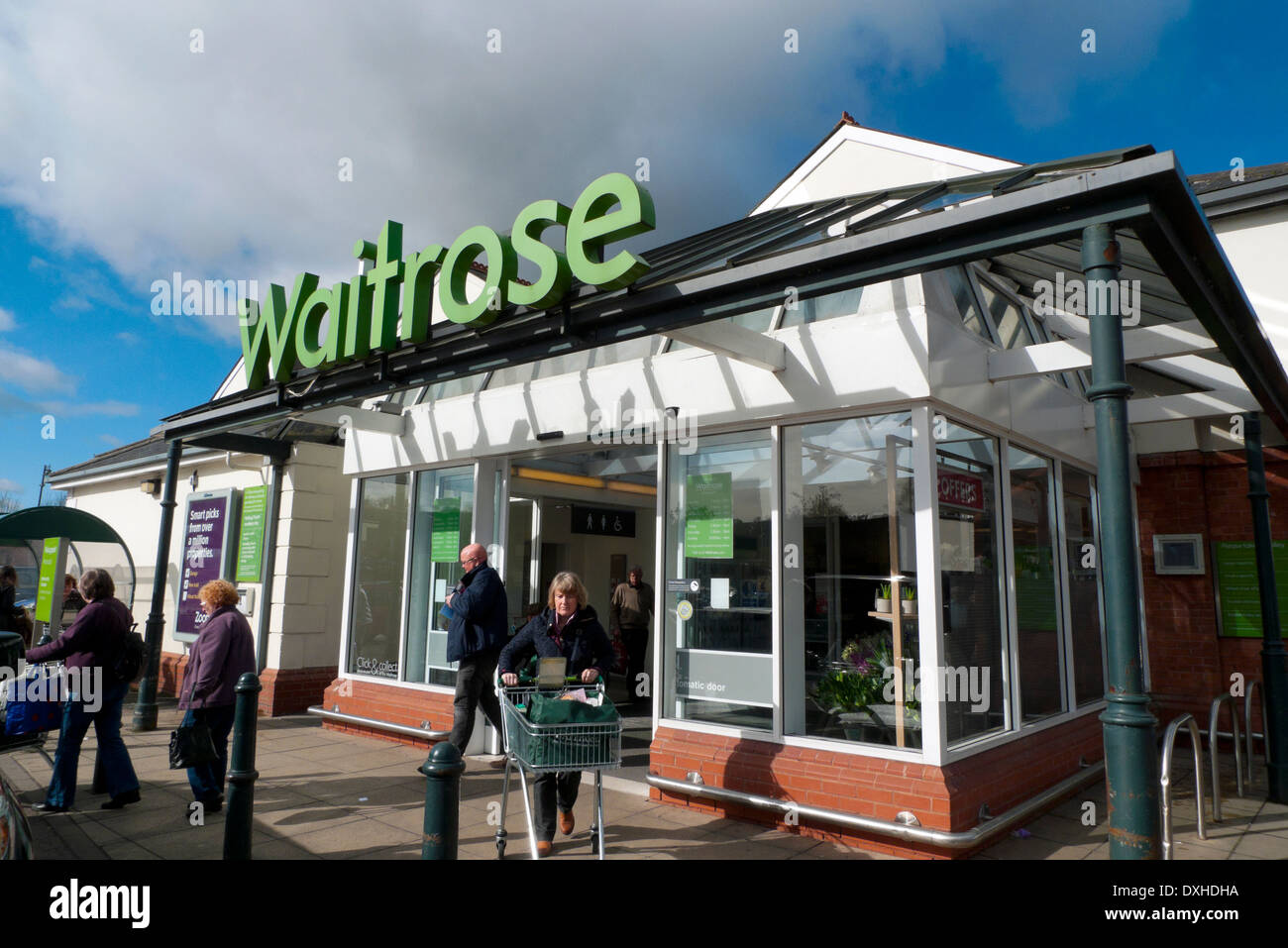 Shoppers leaving Waitrose supermarket in Monmouth, Monmouthsire UK  KATHY DEWITT Stock Photo