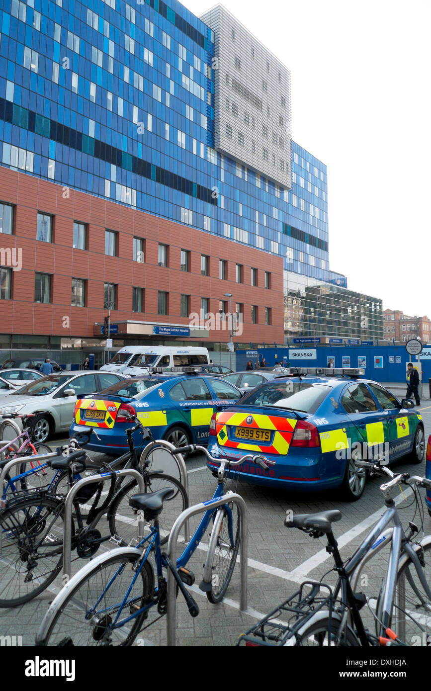 Exterior view of building, bicycles and ambulance cars in carpark at Royal London Hospital in Whitechapel East London, UK    KATHY DEWITT Stock Photo