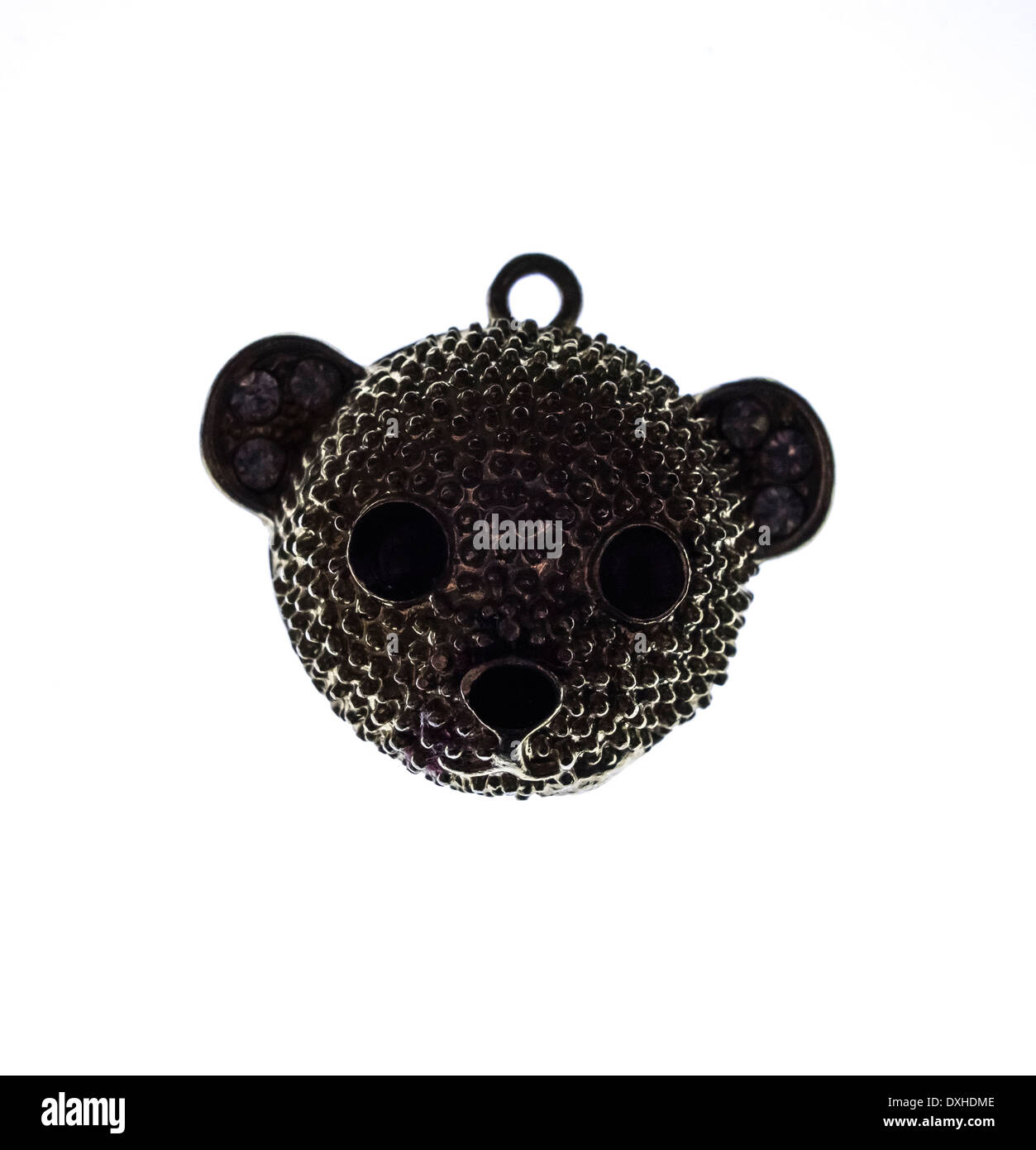 Backlit child's jewelery bears head Studio Stock Photo