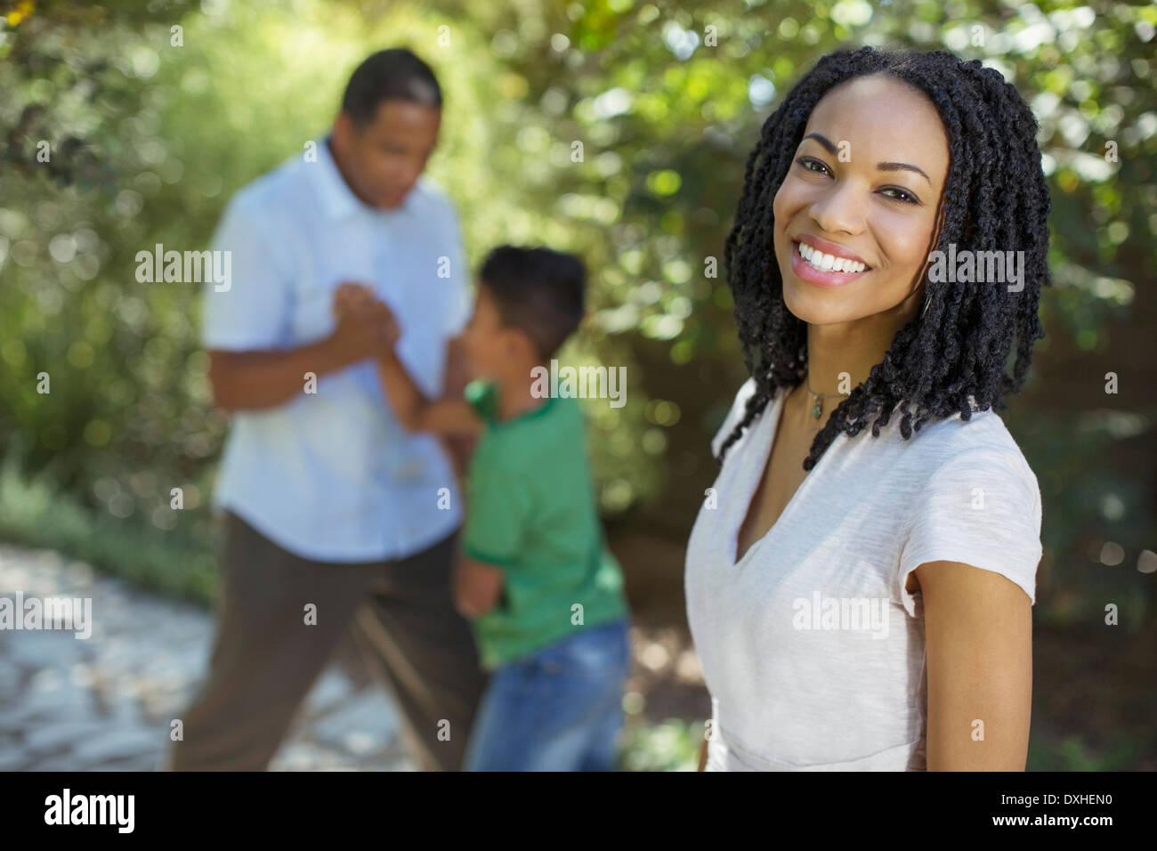 Portrait of smiling woman outdoors Stock Photo