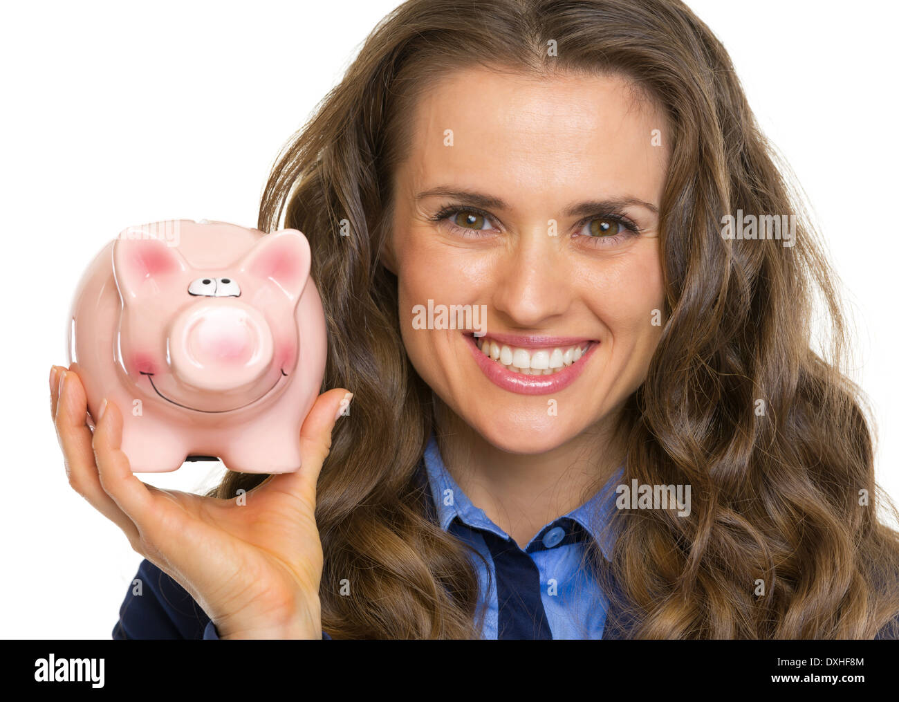 Portrait of smiling business woman showing piggy bank Stock Photo - Alamy