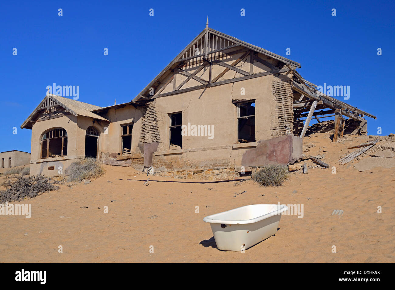 House filled with desert sand former diamond city of Kolmanskuppe now ghost town Kolmanskop Karas Region Namibia Luderitz Stock Photo