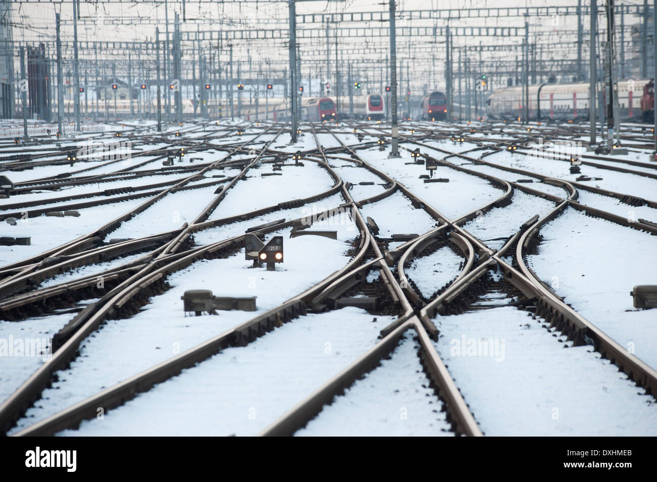 Railroad tracks and junctions are covered with ice and snow at Zurich, Switzerland,  main station Stock Photo