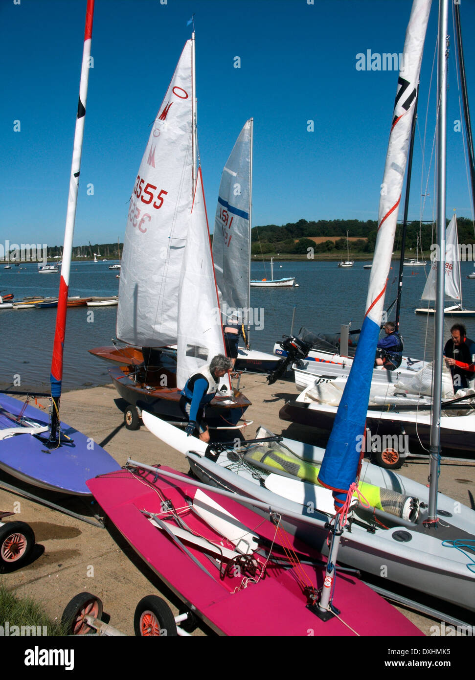 Sailing dinghies being launched, River Deben, Woodbridge, Suffolk