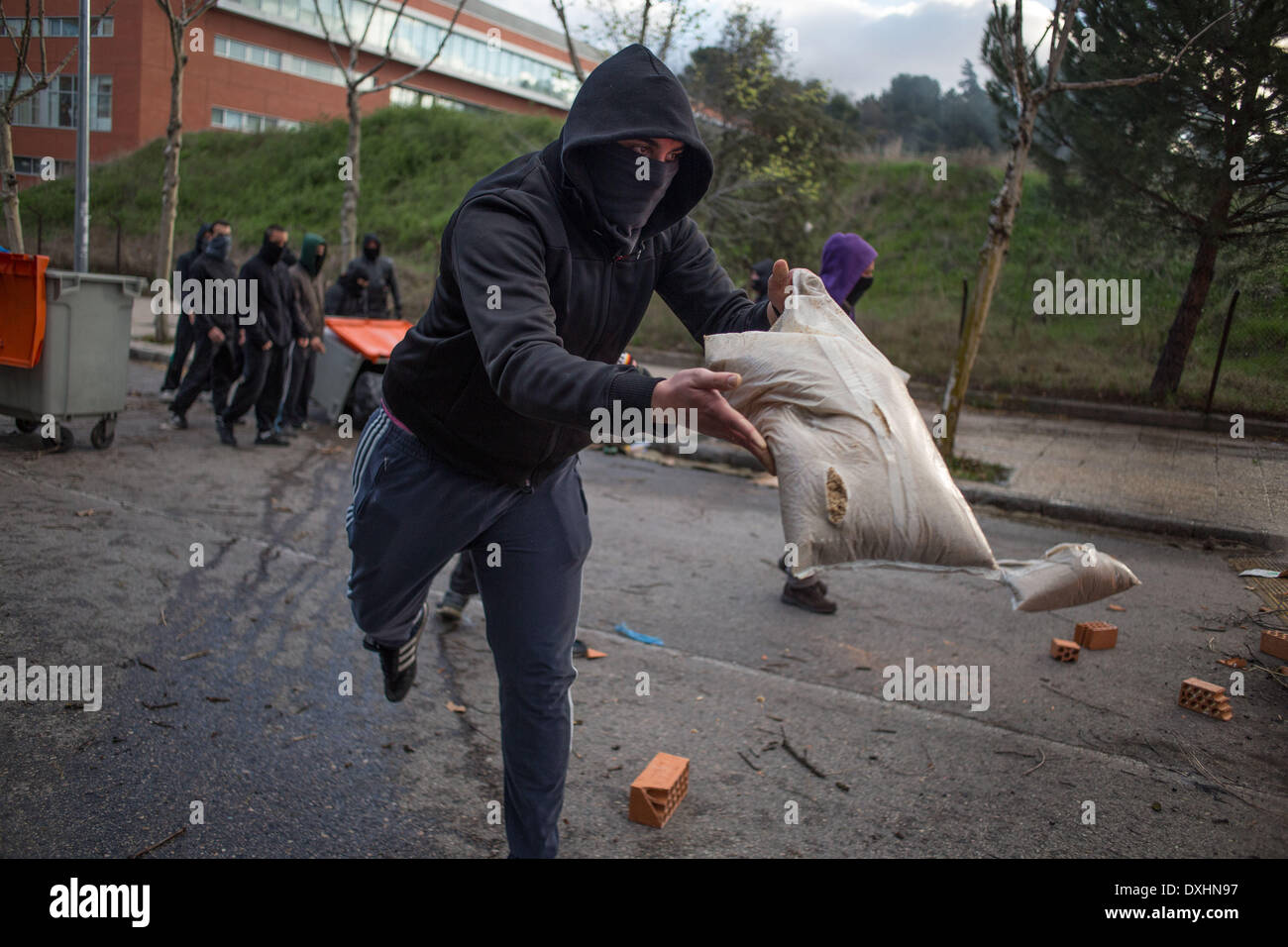 Madrid, Spain. 26th Mar, 2014. Some students has occupied the university and made a barricade near the University of History and Philosophy. The police came around eleven o clock to block the aera and for enter into the university. Credit:  Michael Bunel/NurPhoto/ZUMAPRESS.com/Alamy Live News Stock Photo