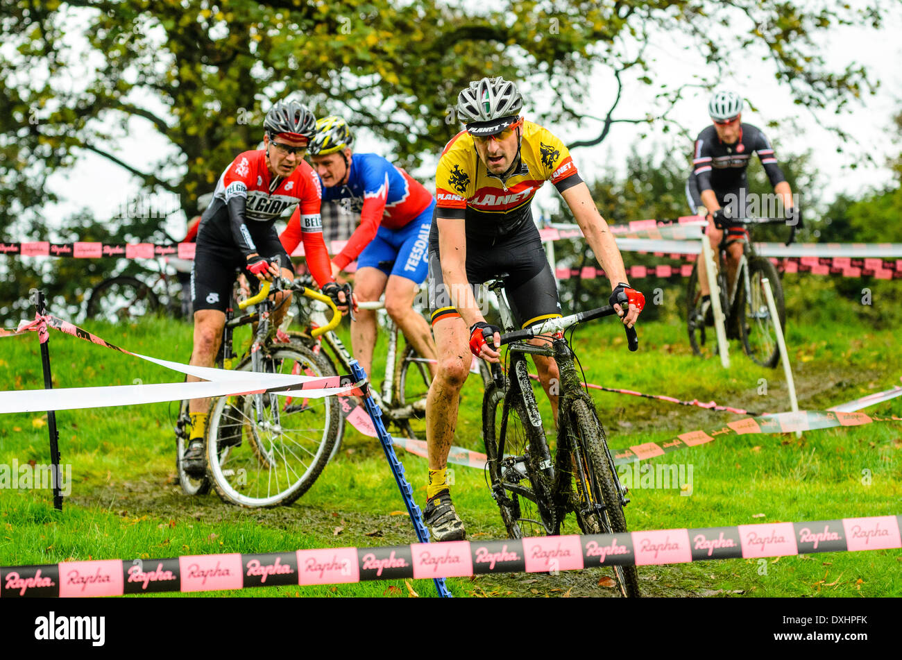 Competitors in Rapha Super Cross cyclo-cross race at Broughton Hall near Skipton North Yorkshire England Stock Photo