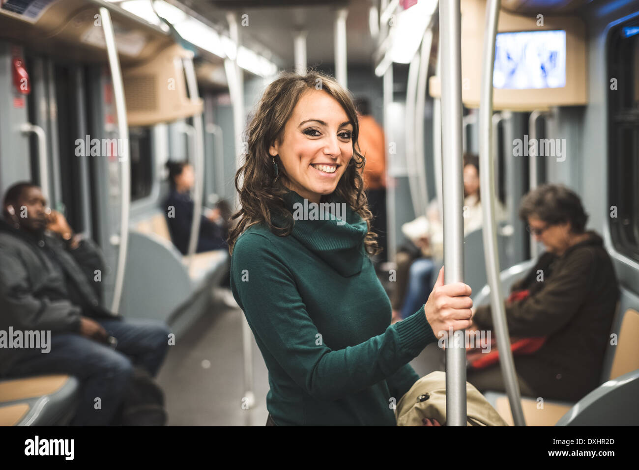 Beautiful woman in the subway hi-res stock photography and images - Alamy