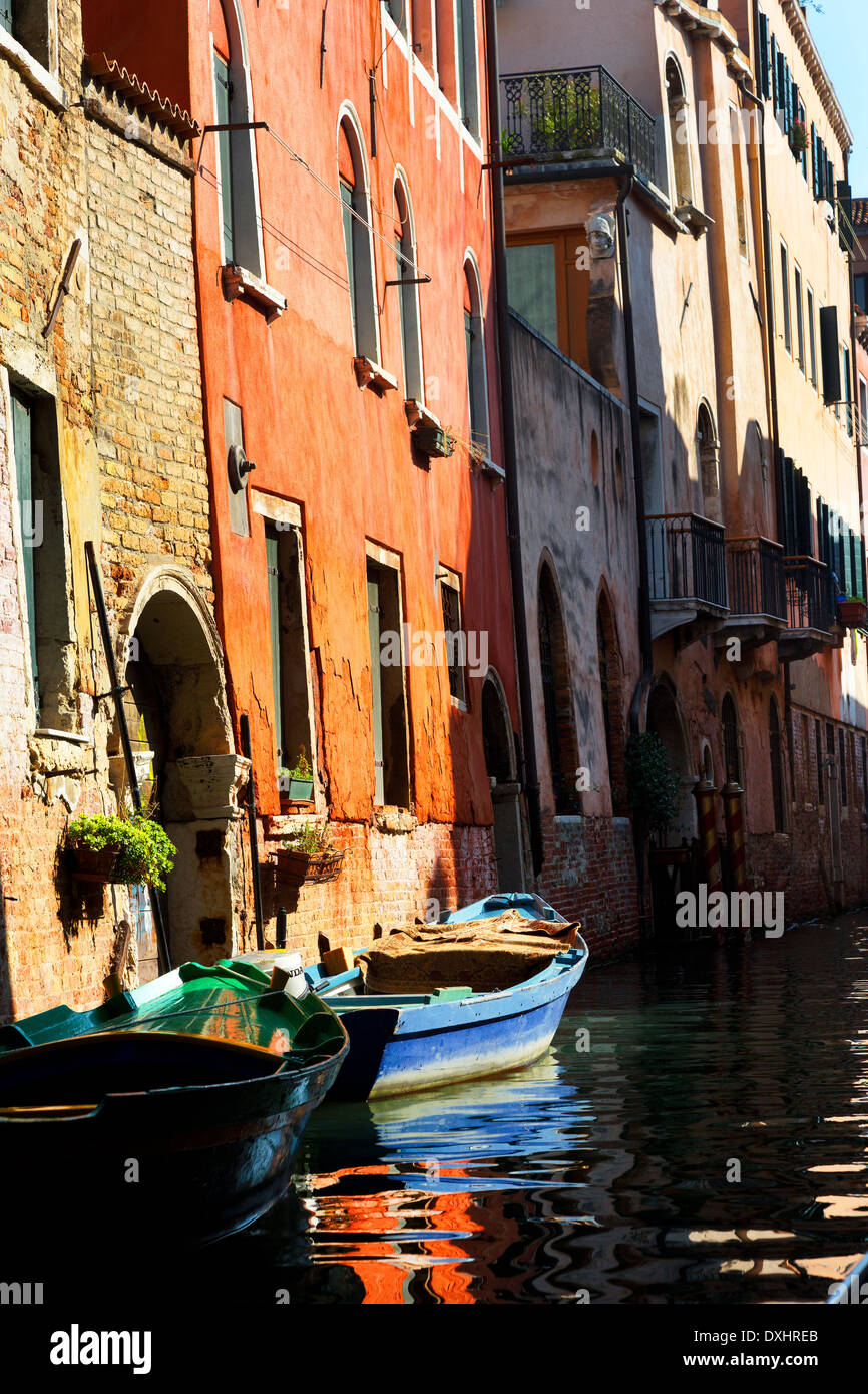 Reflective color in Canal of building and boats Venice, Italy Stock Photo