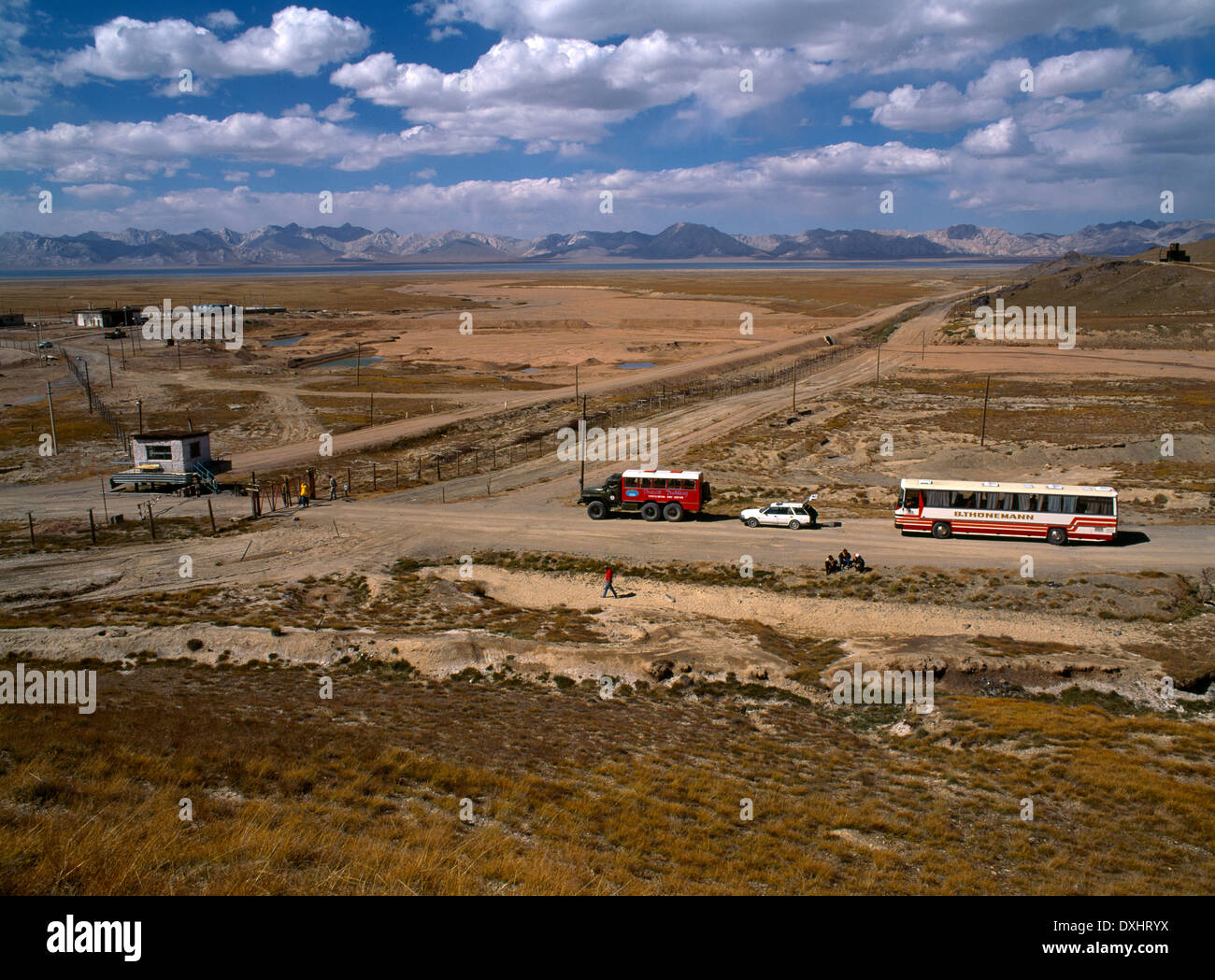 Torugart Pass Kyrgyzstan Vehicles Coming from China Waiting for Kyrgyz Immigration to Open Stock Photo