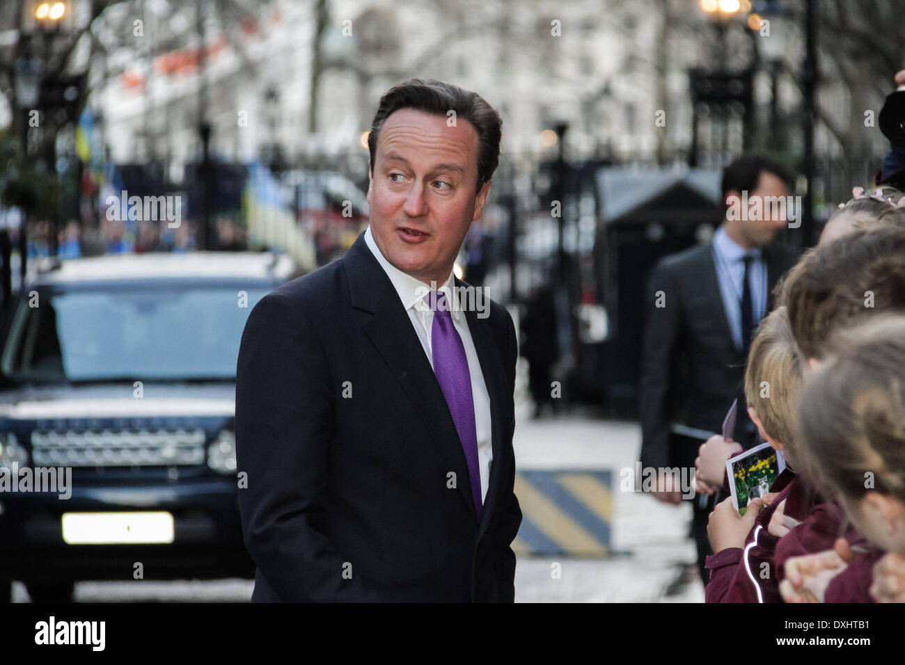 London, UK. 26th March 2014. British Prime Minister David Cameron outside Downing Street meeting with local visiting school children before a meeting with Ukrainian UDAR party MP Vitali Klitschko. Credit:  Guy Corbishley/Alamy Live News Stock Photo