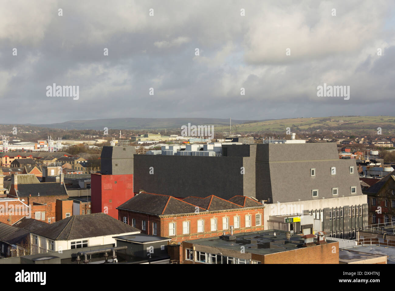Rooftops of Bolton town centre looking north-north-east from Victoria square, dominated by the Marks and Spencer store building. Stock Photo