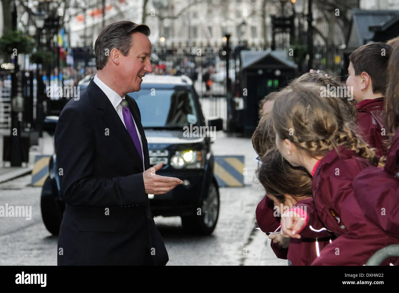 London, UK. 26th March 2014. British Prime Minister David Cameron outside Downing Street meeting with local visiting school children before a meeting with Ukrainian UDAR party MP Vitali Klitschko. Credit:  Guy Corbishley/Alamy Live News Stock Photo