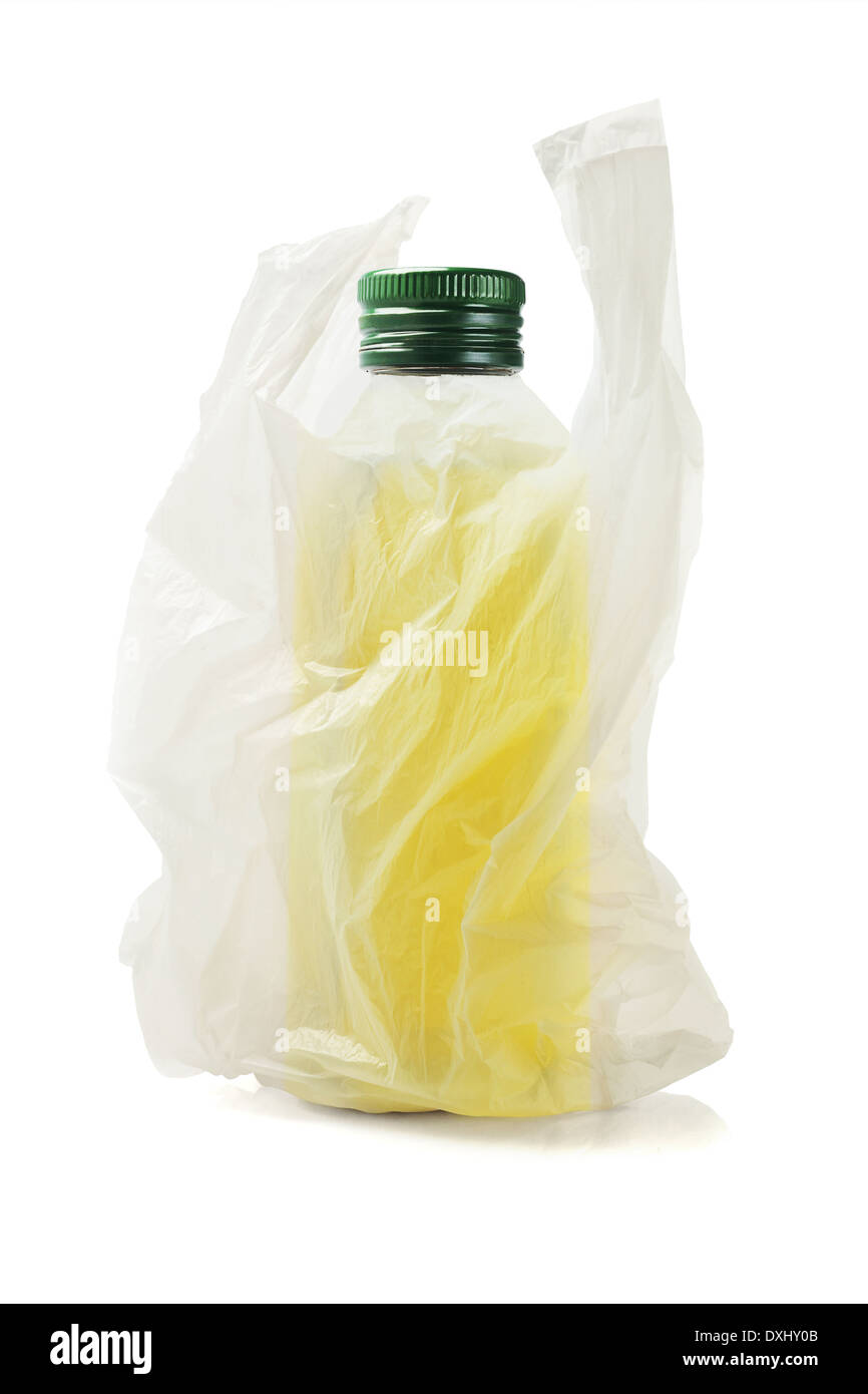 Bottle Of Olive Oil In Plastic Bag On White Background Stock Photo