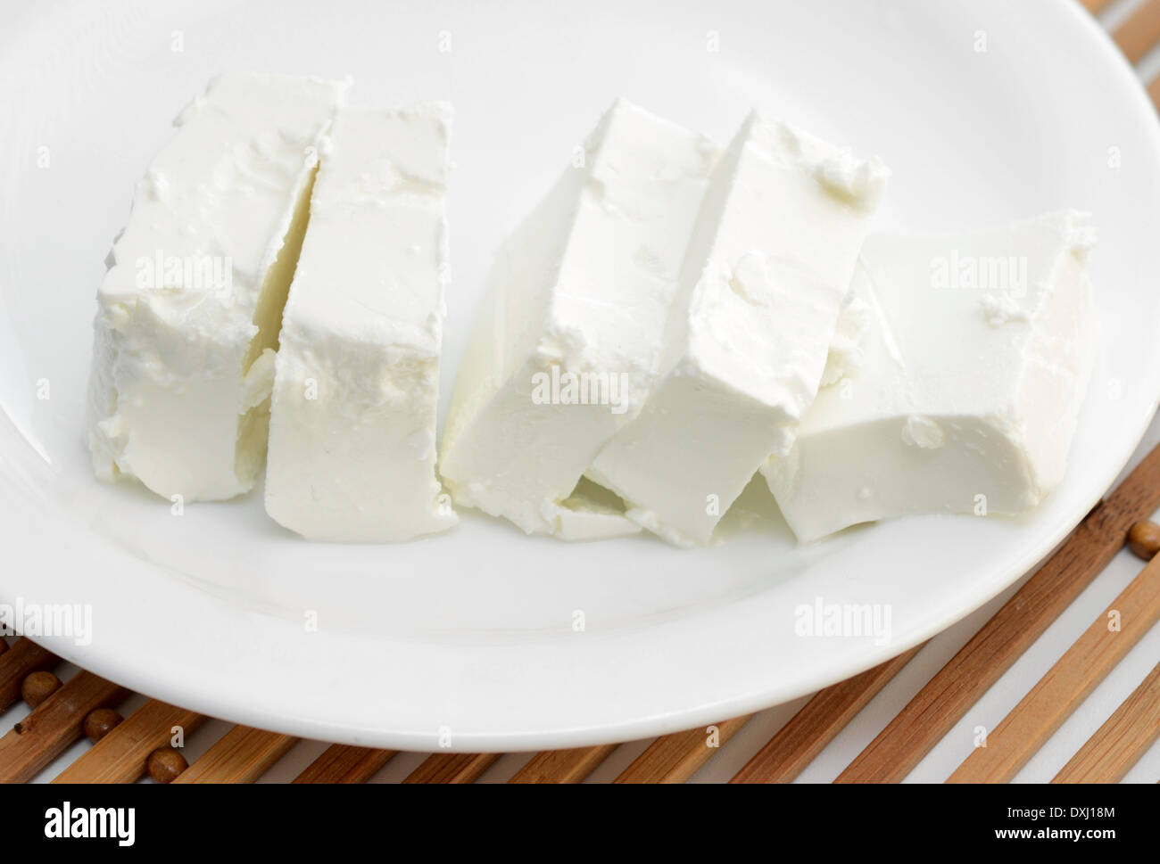 greek goat cheese on plate Stock Photo Alamy