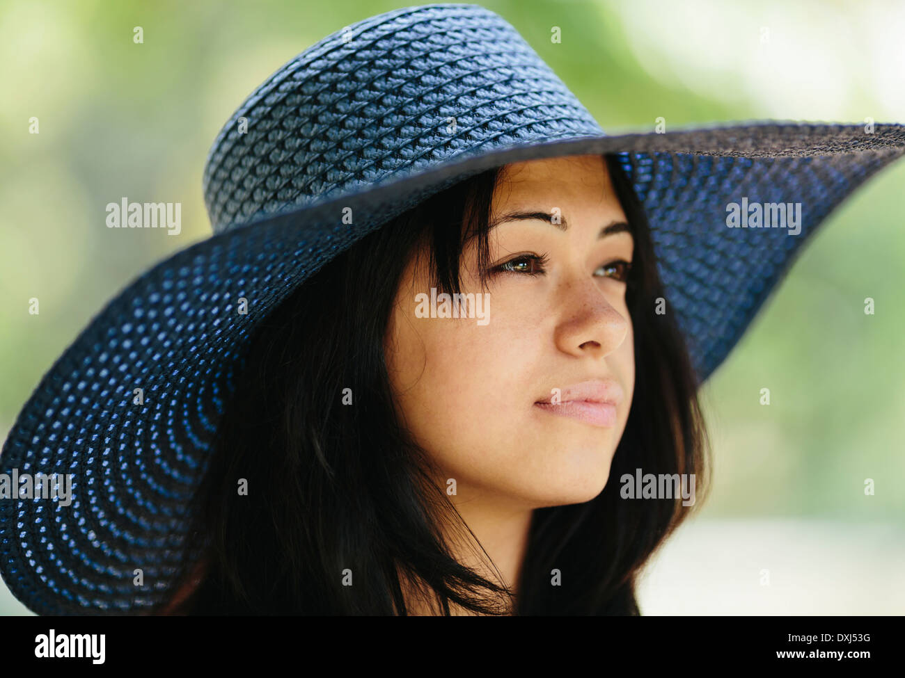 girl wearing a blue hat on the sea beach Stock Photo Alamy