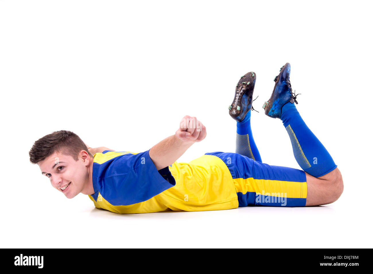 Football player celebrating a goal isolated in white Stock Photo