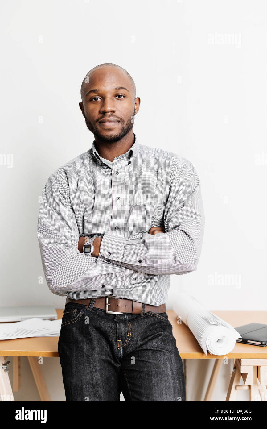 Portrait of confident Black architect in office Stock Photo