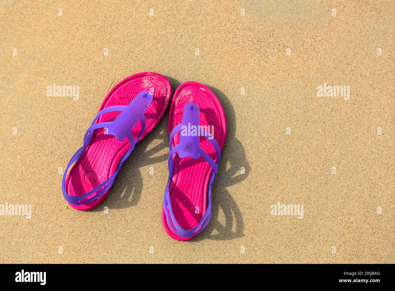 Sandals on the beach - concept image Stock Photo