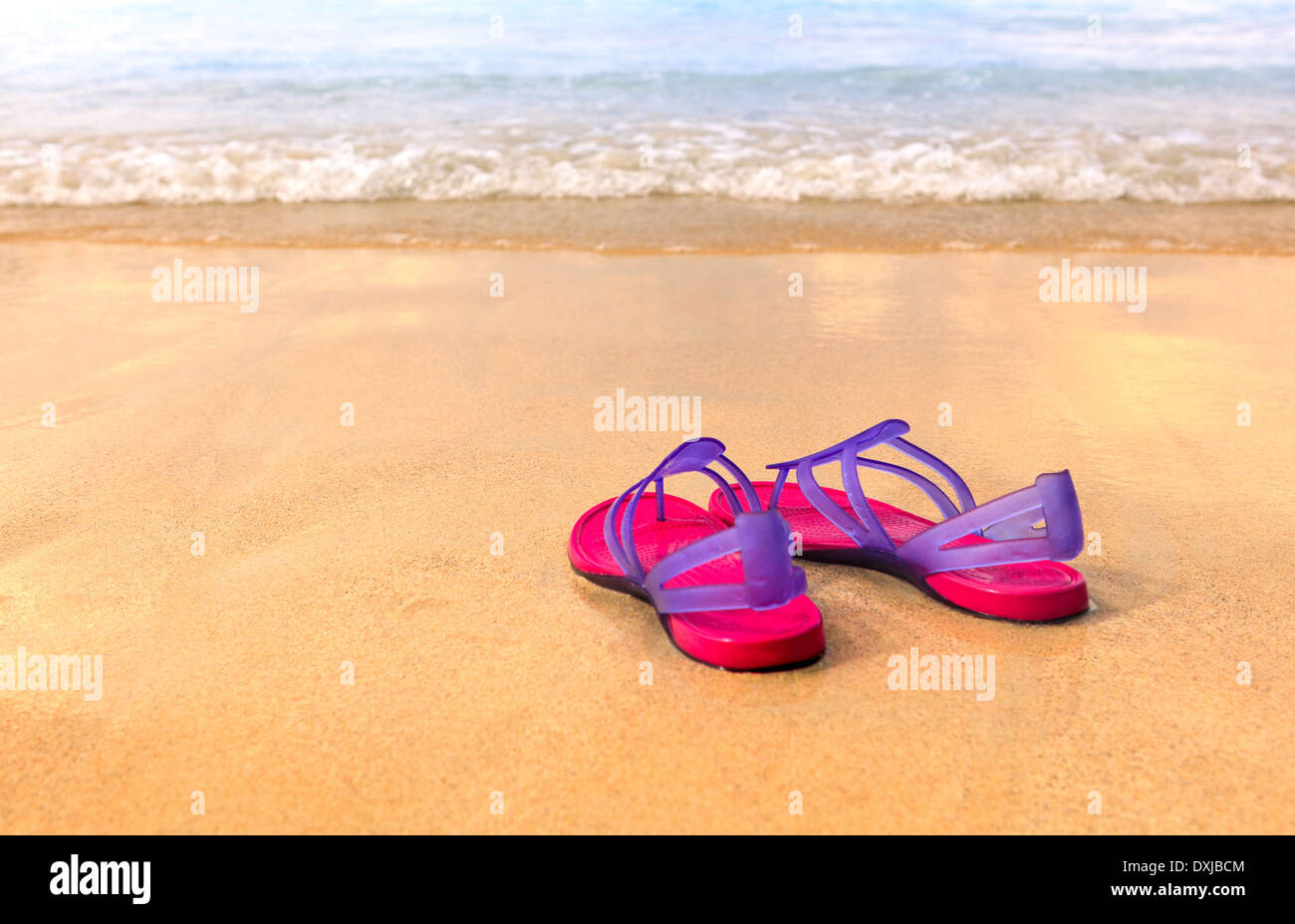 Sandals on the beach - concept image Stock Photo