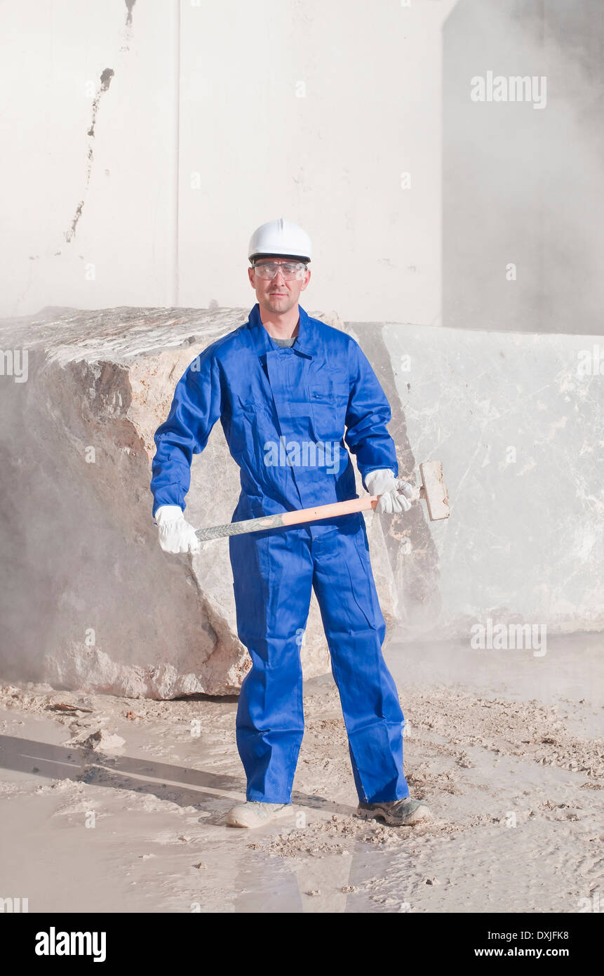 worker with sledgehammer Stock Photo Alamy